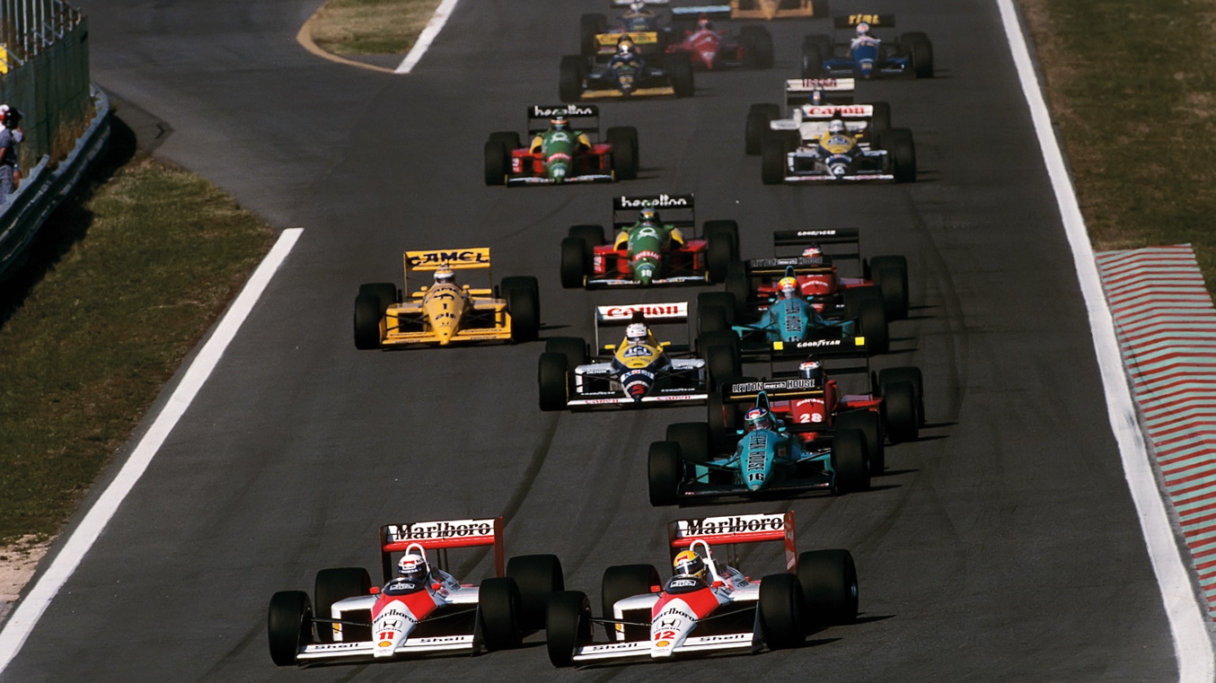 The start of the Portuguese GP in 1988, with the usual sight of both MP4/4s leading the way. The two cars would notch up 10 one-two finishes, but ironically not at this race