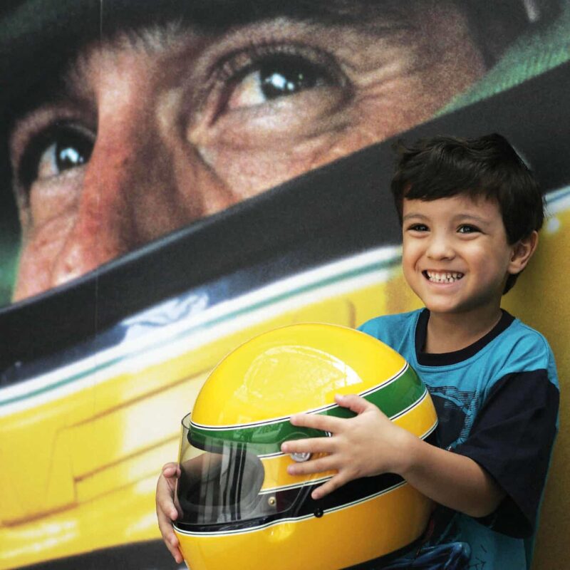 Kid smiles with Senna Helmet