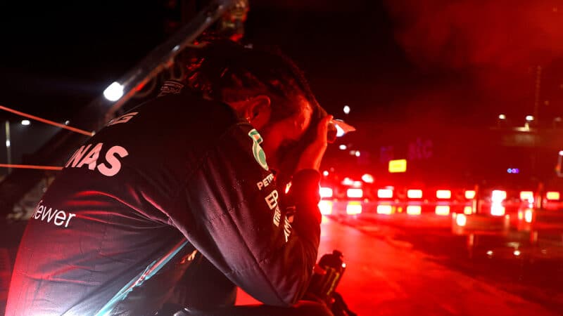 Lewis Hamilton sits wth head in hands after winning the 2021 Saudi Arabian Grand Prix