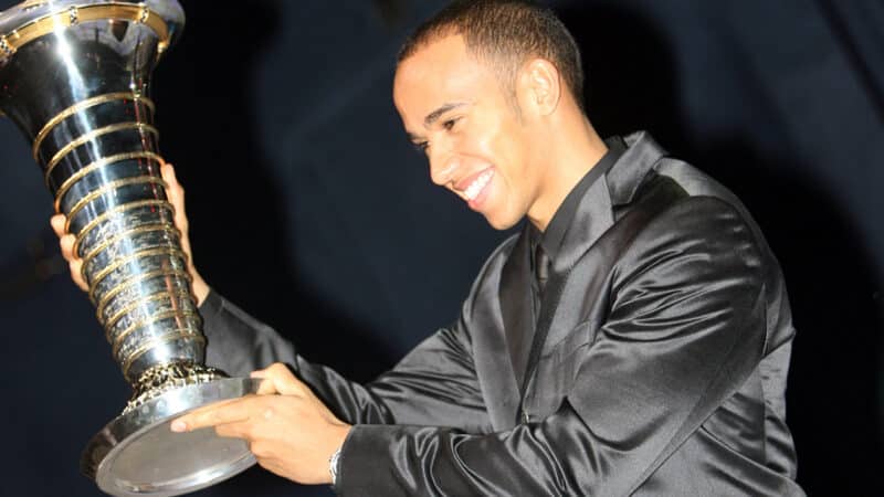 Lewis Hamilton with F1 championship trophy at 2008 prize giving