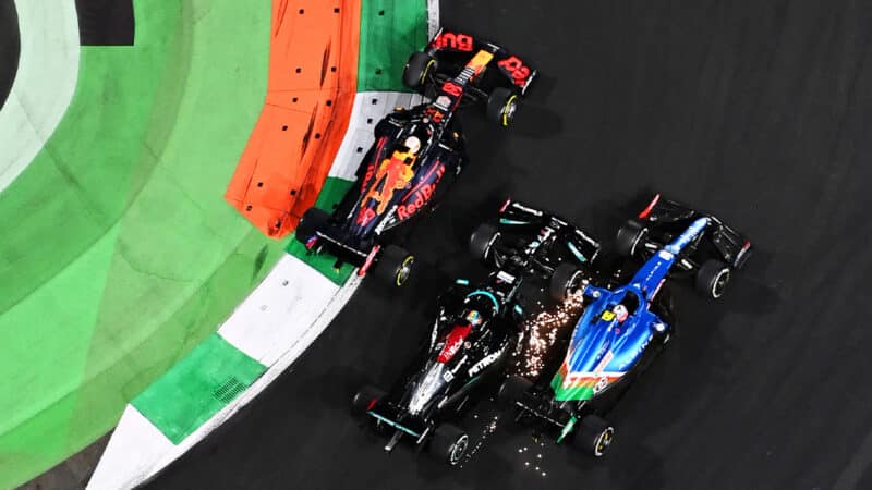 Max Verstappen alongside Lewis HAmilton and Eteban Ocon at 2021 Saudi Arabian GP restart