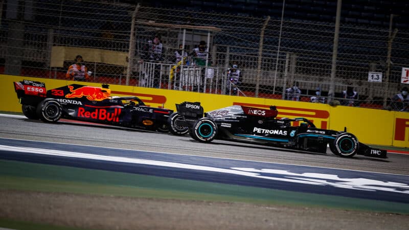 Max Verstappen alongside Lewis Hamilton in 2021 F1 Bahrain GP