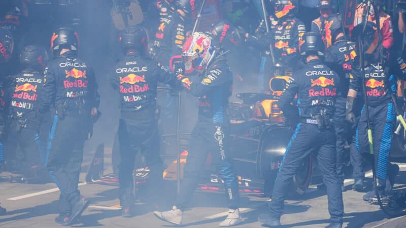 Max Verstappen walks away from Red Bull engulfed in smoke at the 2024 F1 Australian Grand Prix