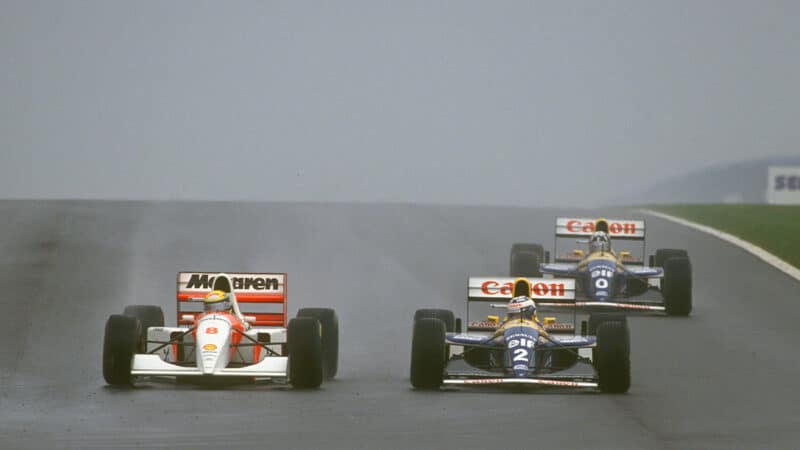 Ayrton Senna passes Alain Prost at Doinington PArk in 1993 F1 European Grand Prix