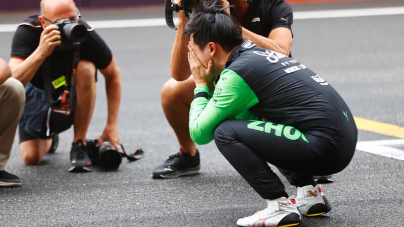 Emotional Zhou Guanyu crouches down on F1 grid after 2024 Chinese Grand Prix