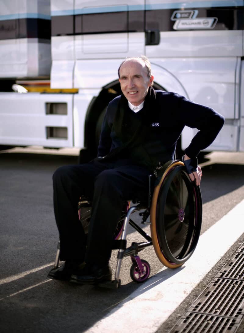 Frank-Williams-in-wheelchair-in-F1-paddock