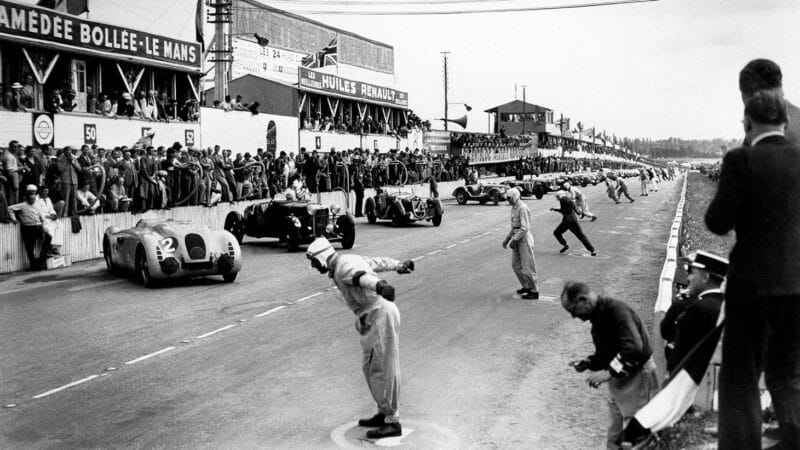 Less than three months from the start of World War II, drivers run to their cars at the 1939 Le Mans 24 Hours. It would be 10 years before the race would return