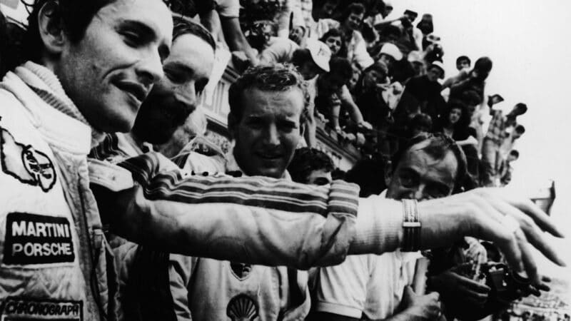 celebrating Le Mans victory in 1977 with Jürgen Barth and Hurley Haywood