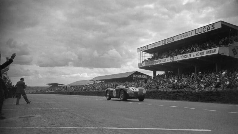 Jaguar’s breakthrough: the XK120 of Duncan Hamilton and Tony Rolt crosses the finish line to record the brand’s first Le Mans win in 1953