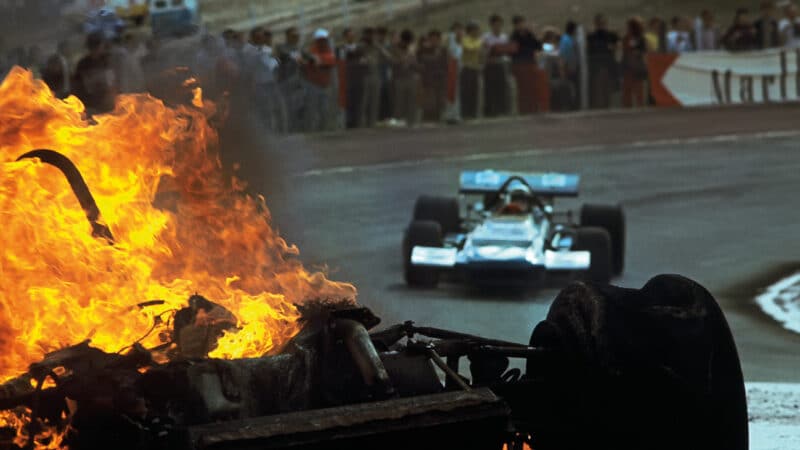 the flaming wreckage of Ickx and Oliver’s cars at Jarama in Spain, 1970