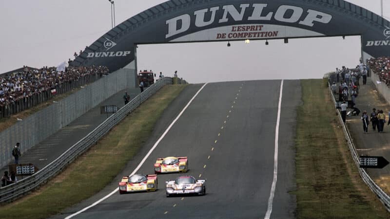 Winning Jaguar of Lammers, Andy Wallace and Johnny Dumfries fights the 962Cs