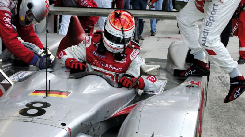 A driver change after 21 hours racing, as Emanuel Pirro makes way for Audi team-mate Frank Biela at the 2006 Le Mans 24 Hours