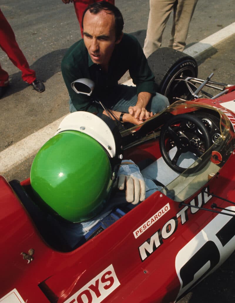 Henri-Pescarolo-in-F1-car-cockpit-talks-to-Frank-Williams-in-1971