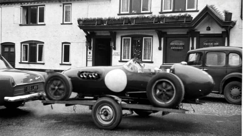 Nothing to see here: the tiny Lotus 12 arrives behind Colin Chapman’s Consul for its illicit drive