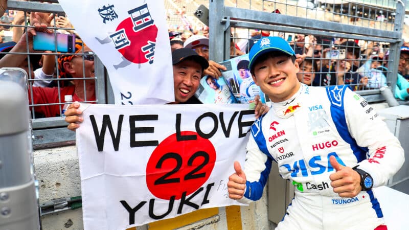 Yuki Tsunoda with fans at 2024 Japanese Grand Prix
