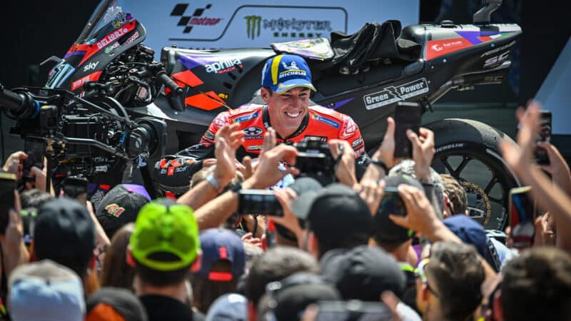 Aleix Espargaro cheered by fans after winning the 2024 MotoGP Catalan sprint race