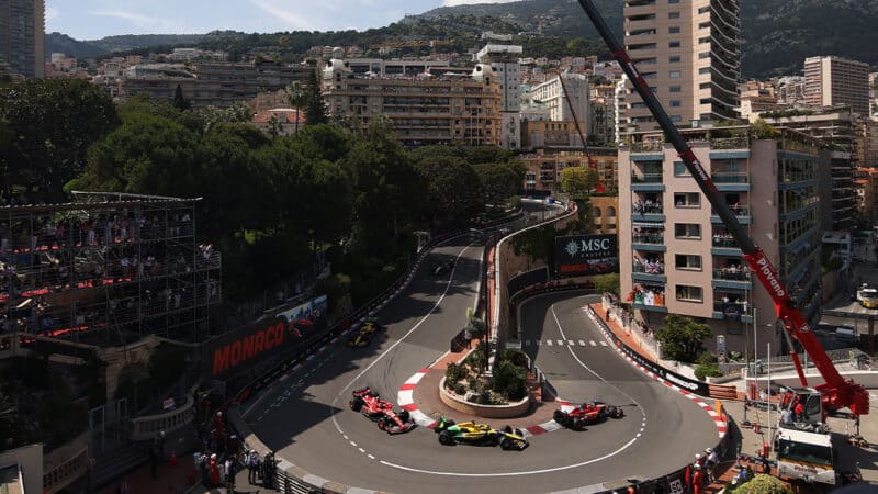 Charles Leclerc leads Oscar Piastri and Carlos Sainz at hairpin in 2024 F1 Monaco Grand Prix