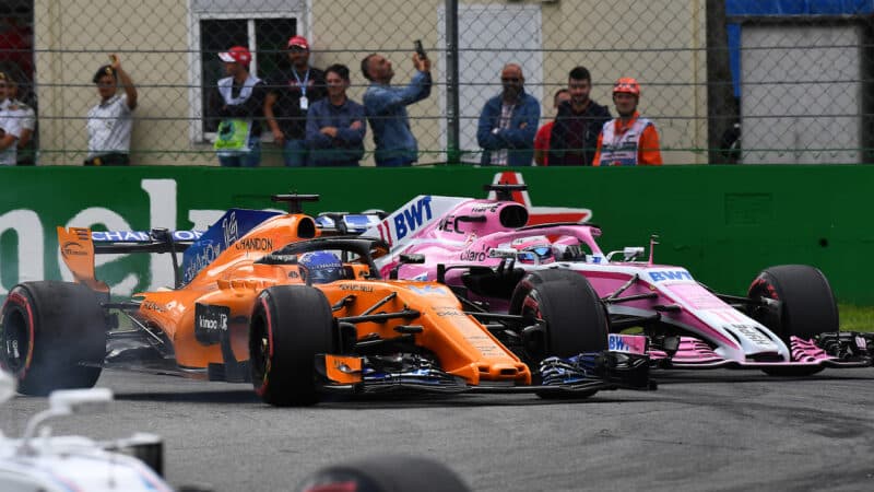 Fernando Alonso and Sergio Perez battle wheel to wheel in 2018 F1 Italian GP