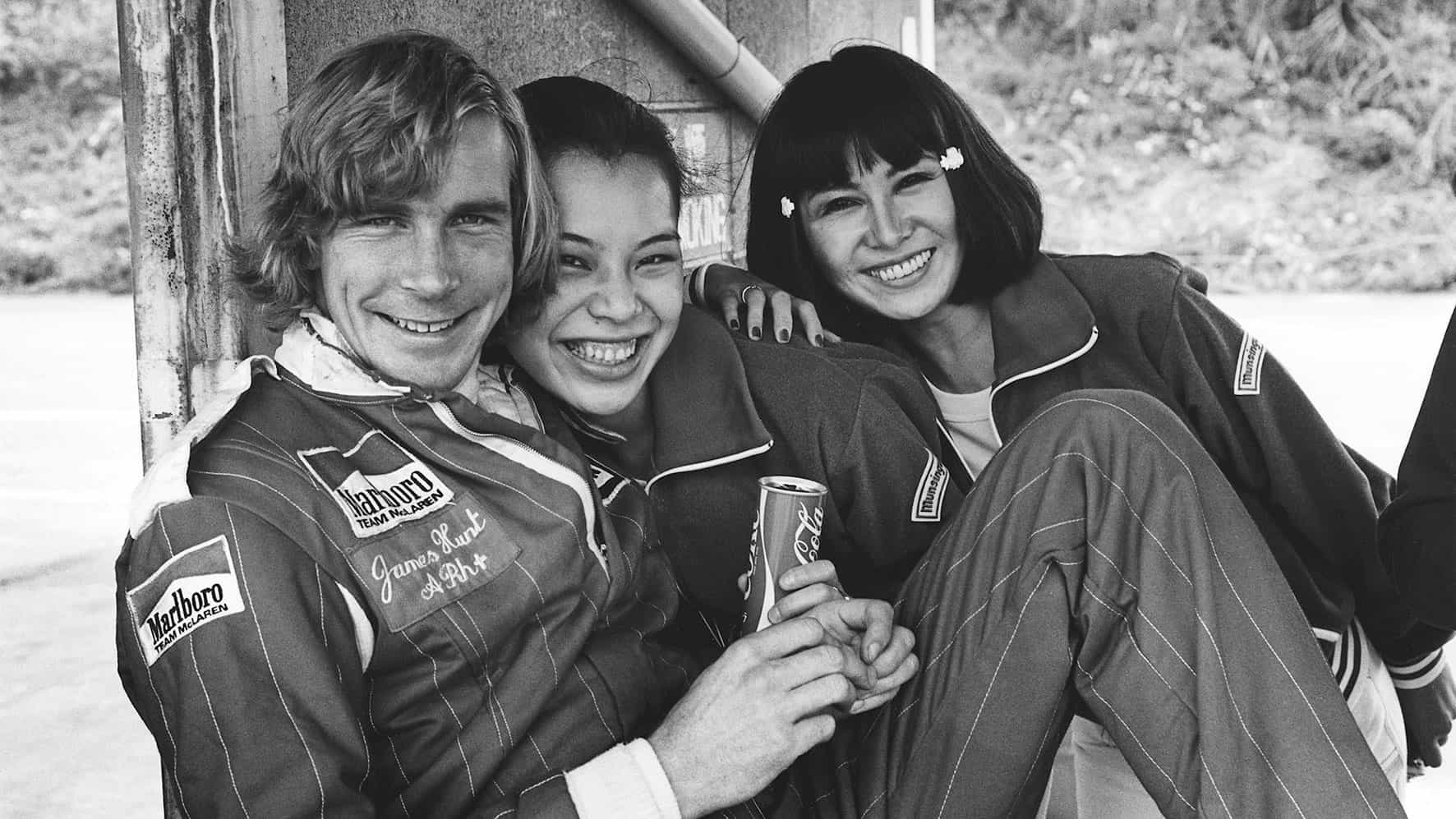 James Hunt celebrates with two women