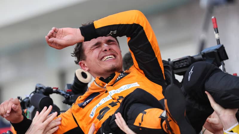 Lando Norris lifted into the air by his McLaren team after winning the 2024 F1 Miami Grand Prix