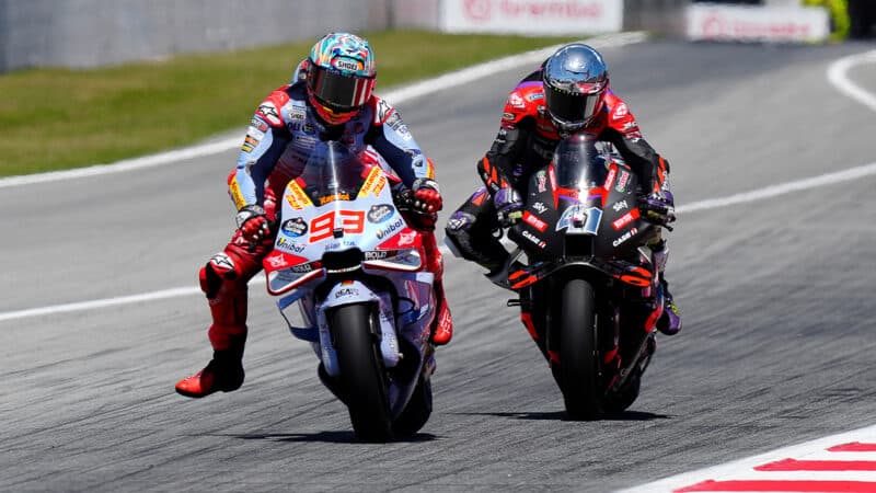 Marc Marquez alongside Aleix Espargaro in 2024 MotoGP Catalan GP