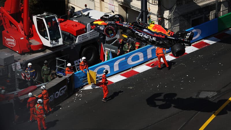 Red Bull of Sergio Perez is lifted into the air after 2023 Monaco GP qualifying crash