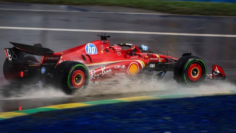 Ferrari of Charles Leclerc drives through puddle in 2024 F1 Canadian GP