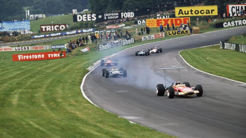 Smoke pours from Oliver’s 49 in the 1968 British GP, the result of a mechanic’s error