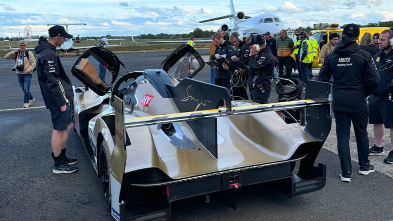 Jota team surround Le Mans car at airport shakedown