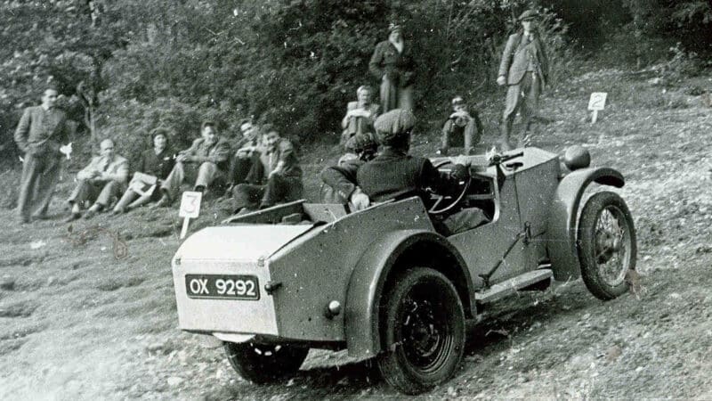 Colin Chapman with Hazel Chapman in Lotus MkI on trials