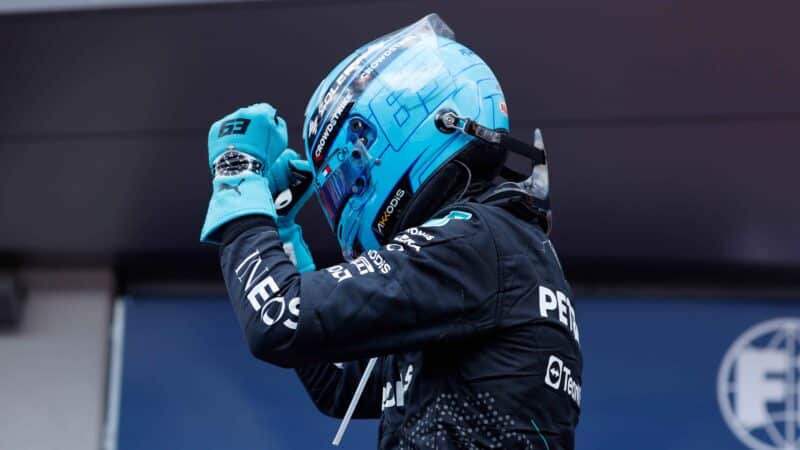 George Russell holds his fists up after winning the 2024 F1 Austrian Grand Prix