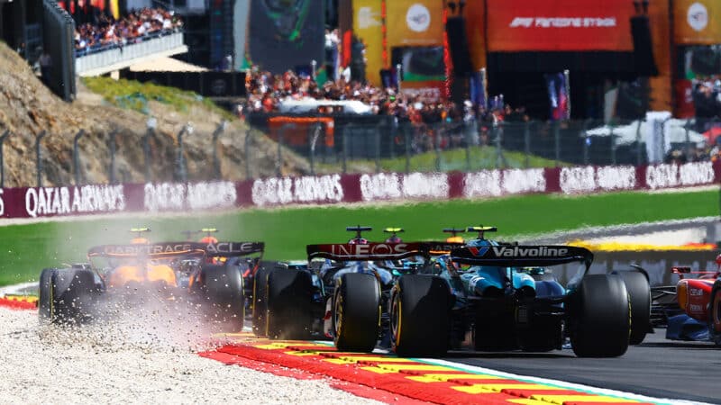 Lando Norris runs off in gravel at start of 2024 F1 Belgian Grand Prix