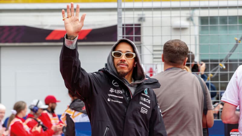 Lewis Hamilton waving to the fans