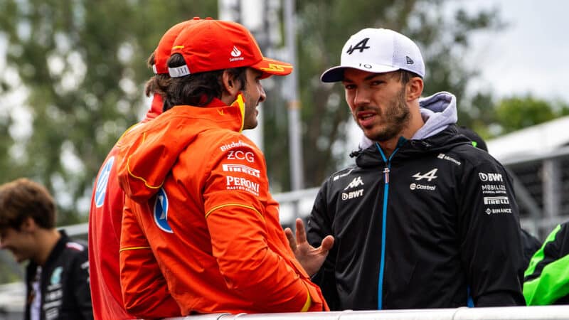 Pierre Gasly talks to Carlos Sainz at 2024 F1 Canadian GP