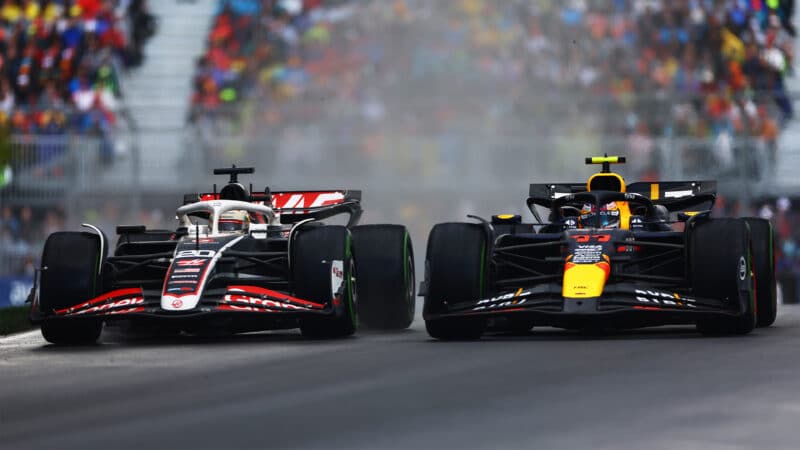 Sergio Perez battles Haas in a Red Bull at 2024 Canadian GP