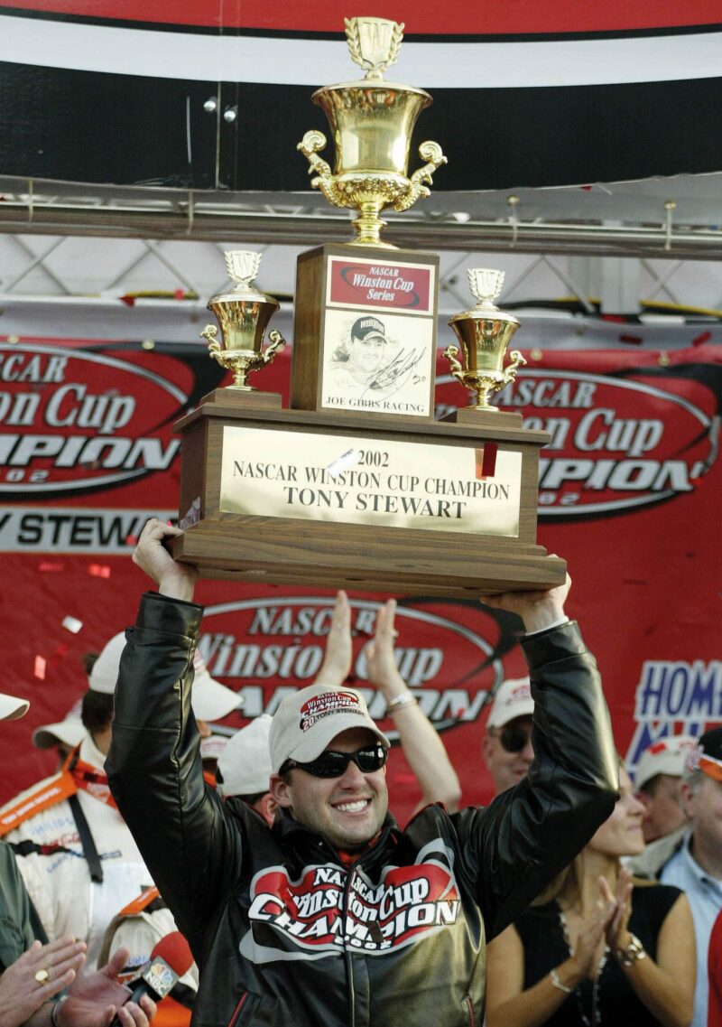 Tony Stewart with NASCAR’s 2002 Cup trophy