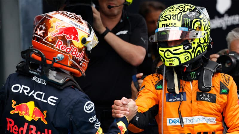 Lando Norris and Max Verstappen shake hands at the 2024 Spanish Grand Prix