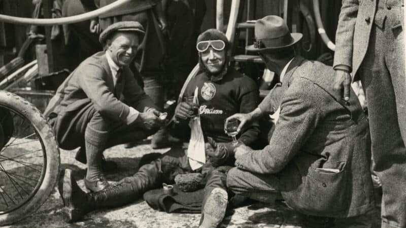 Thirsty work for Le Vack, centre, who won the Brooklands 500 on an Indian motorcycle in 1921