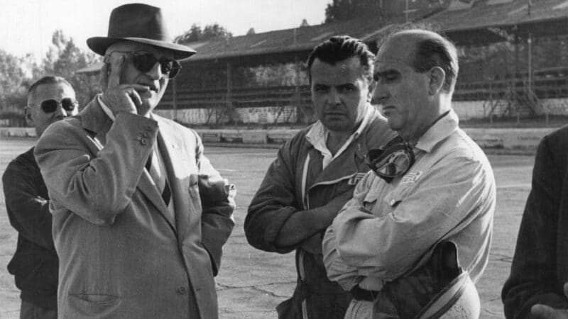 Enzo Ferrari (left) speaks with Farina during testing, the pair had an up and down relationship.