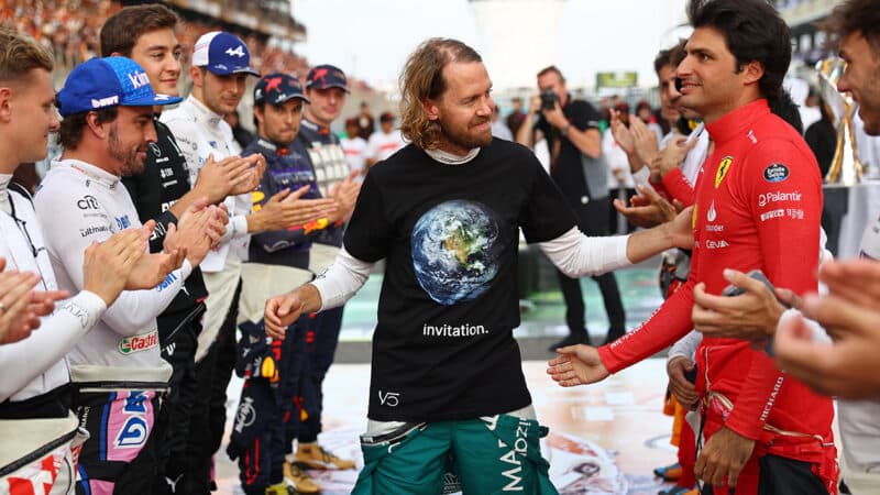 Sebastian receives a guard of honour from F1 drivers at his final grand prix in Abu Dhabi