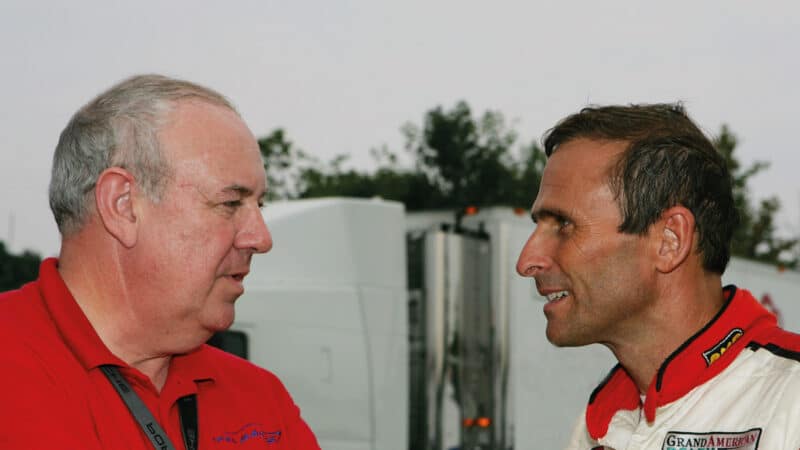 2005, on IMSA duties, left, in discussion with driver David Murry