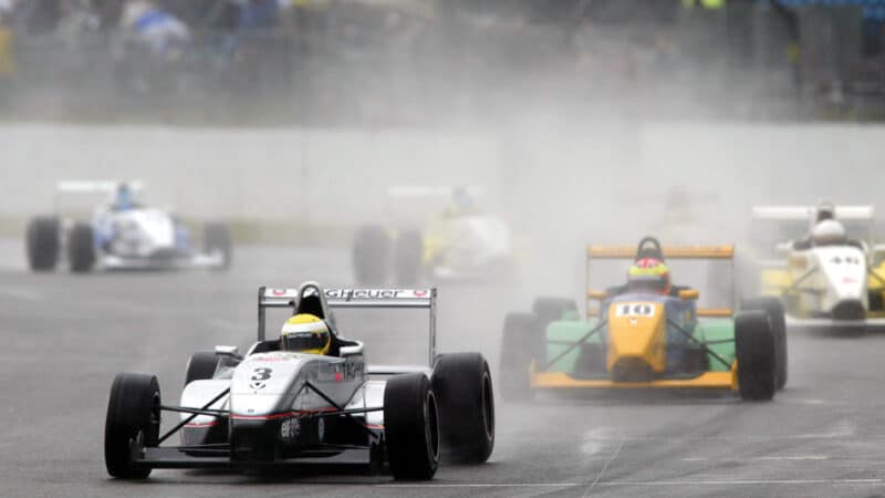 Hamilton leads on the final lap at Silverstone in 2003; fast forward 21 years and he’s still winning here