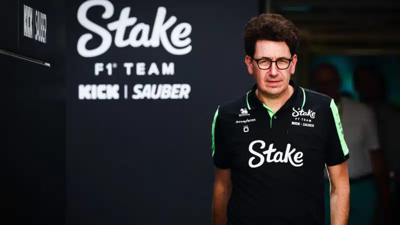 Mattia Binotto in front of Sauber F1 pit garage