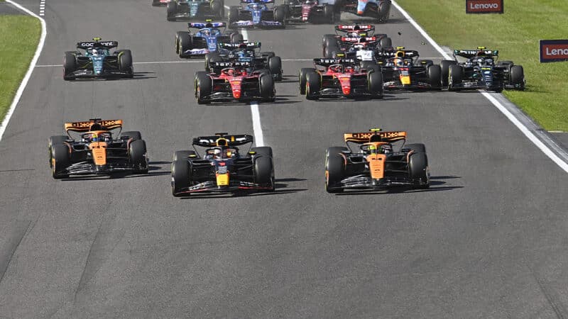 Max Verstappen between two McLaren drivers at start of 2024 F1 Japanese Grand Prix