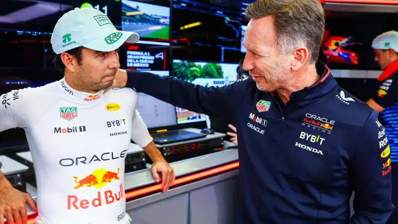 Christian Horner with his hand on the shoulder of Sergio Perez at 2024 F1 Mexican Grand Prix