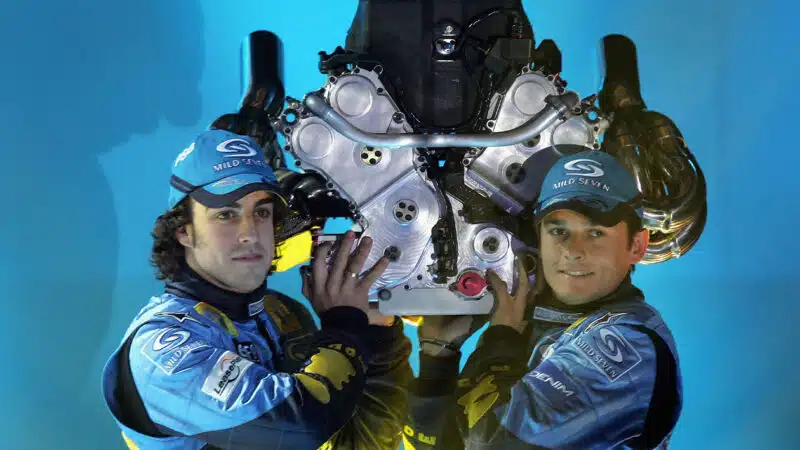 Fernando Alonso and Giancarlo Fisichella hold Renault V10 engine on their shoulders