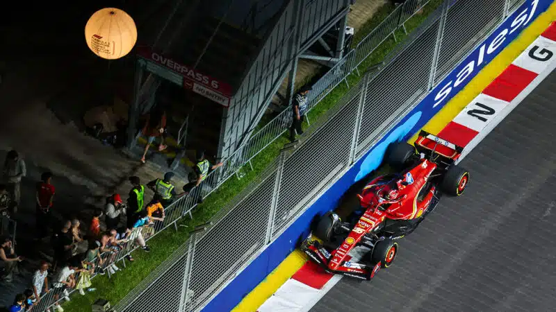 Ferrari of Carlos Sainz brushes the wall in 2024 F1 SIngapore Grand Prix