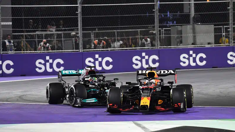 Max Verstappen and Lewis Hamilton run of track in the 2021 Saudi Arabian GP