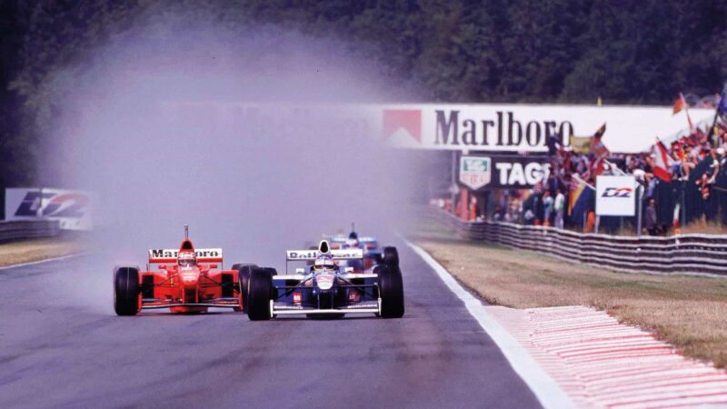 Michael Schumacher passes Jacques Villeneuve 1997 Belgian GP