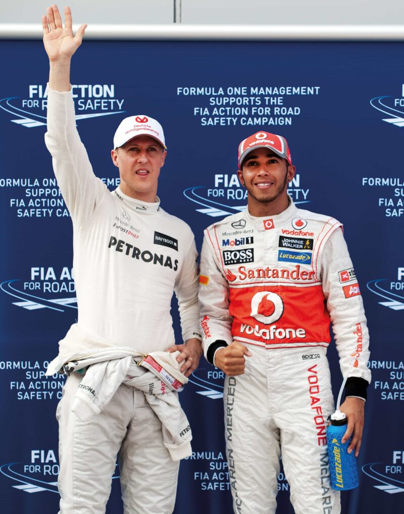 Michael Schumacher with Lewis Hamilton Malaysian GP 2012